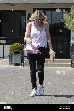 Dakota Fanning leaves Ramirez Tran salon in Los Angeles on August 20, 2015