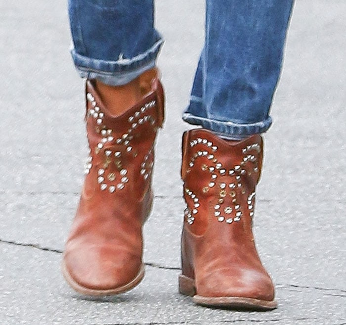 Alessandra Ambrosio steps out in Isabel Marant&rsquo;s sold-out &ldquo;Caleen&rdquo; boots, featuring Western-inspired stud detailing that adds edge to any casual outfit