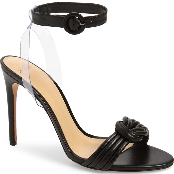 Slim leather straps are knotted at the toe of a sleek leather sandal lofted by a stiletto heel and secured with a svelte, invisibly anchored strap.
