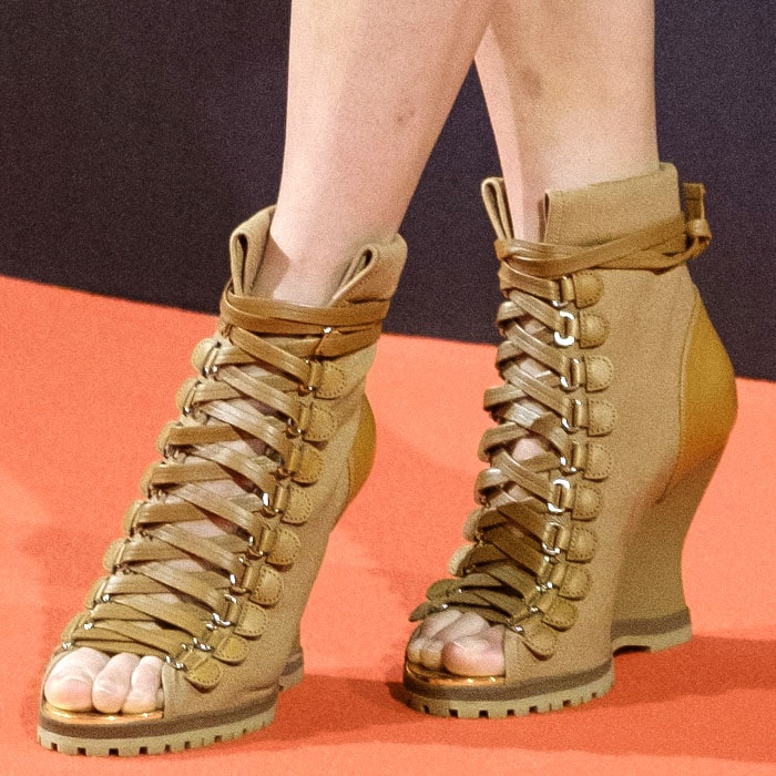 A closer view of the Chlo&eacute; &ldquo;River&rdquo; boots shows their lug sole, metallic trim, and utilitarian lace-up design