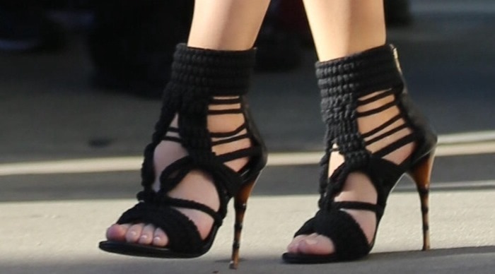 Khlo&eacute; Kardashian wearing braided-rope sandals by Balmain