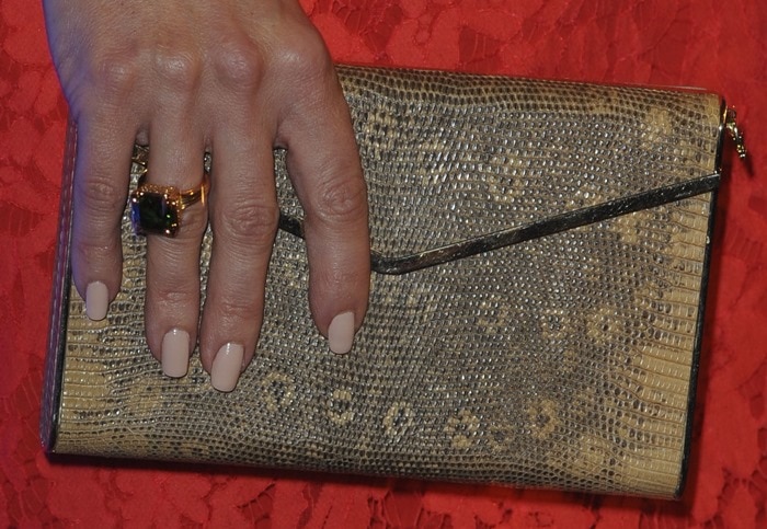 Kate Hudson toting&nbsp;a snake-print Brian Atwood clutch