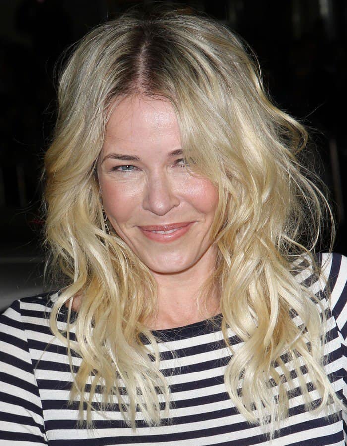 Chelsea Handler radiates effortless elegance at the 'This Means War' premiere in a casual yet chic striped dress, demonstrating her unique style at Grauman&rsquo;s Chinese Theatre, Hollywood