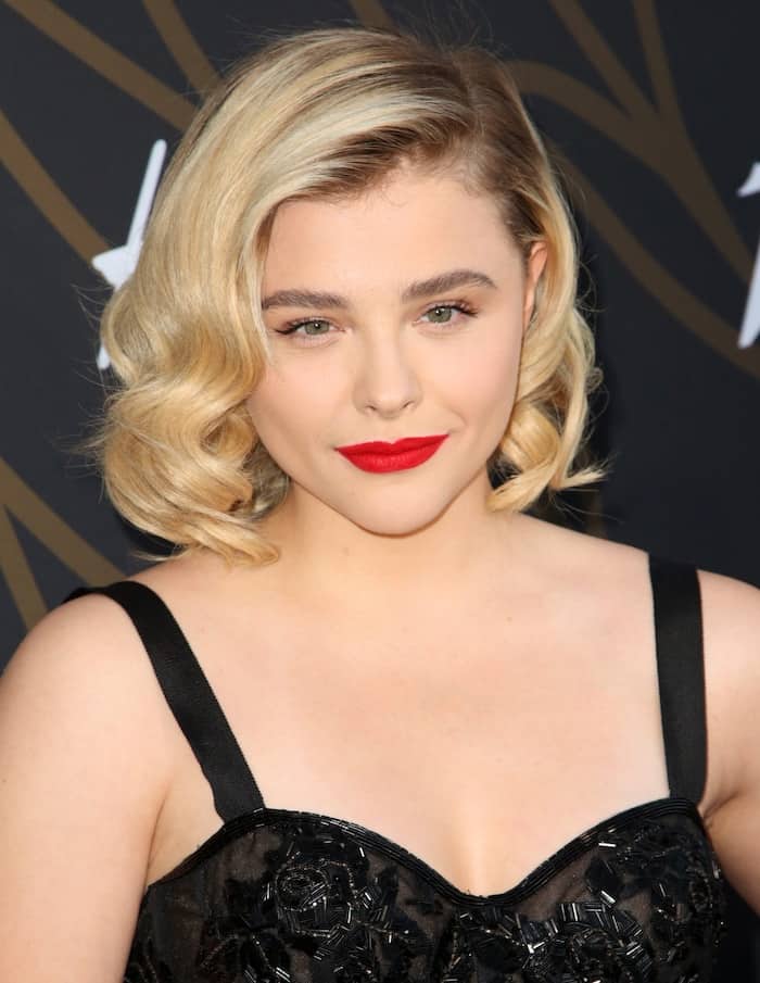 Chlo&euml; Grace Moretz complemented her '50s glam look with a wavy bob and bright red lips