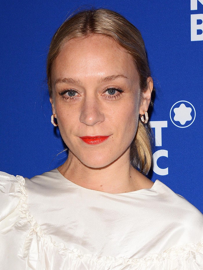 Chlo&euml; Sevigny rocking orange lipstick.