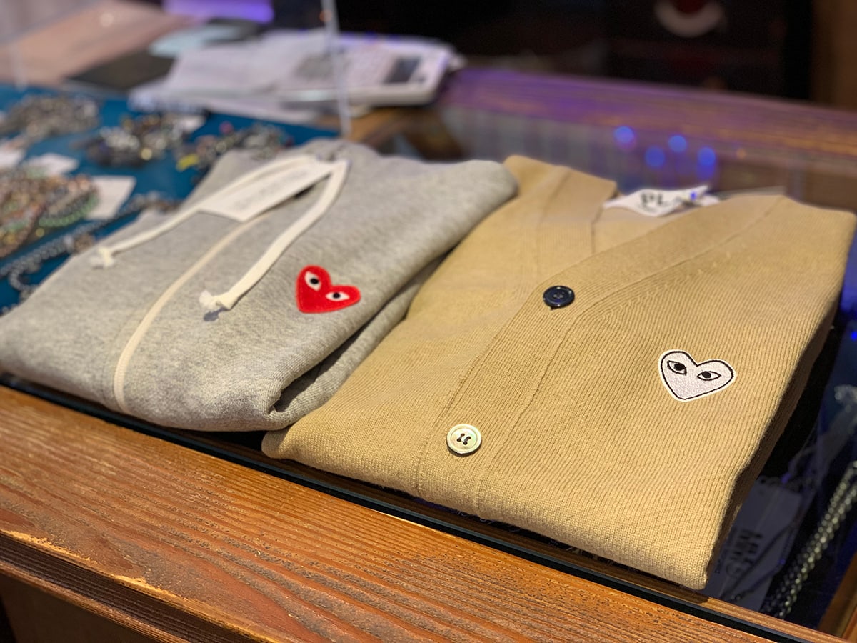 Easily recognizable for its iconic heart face logo, Comme des Gar&ccedil;ons is a Japanese brand founded in 1969 as a &ldquo;borrowed from the boys&rdquo; womenswear brand