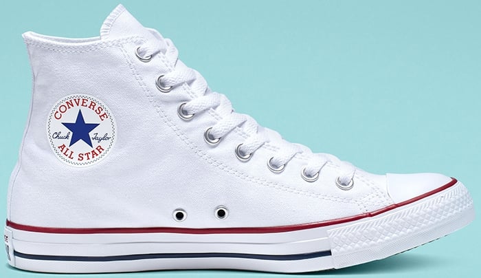 Authentic Converse Chuck Taylor All Star high-top sneaker featuring the classic navy star ankle patch on white canvas