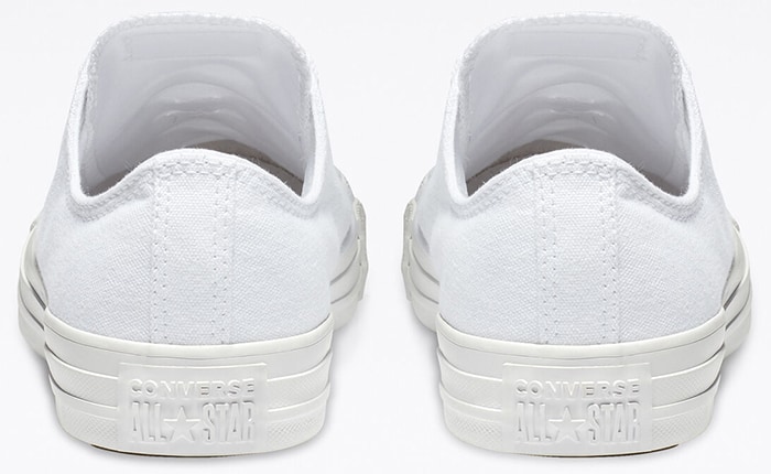 White monochrome Converse Chuck Taylor All Star low-top featuring a tonal 3D heel patch and matching white midsole