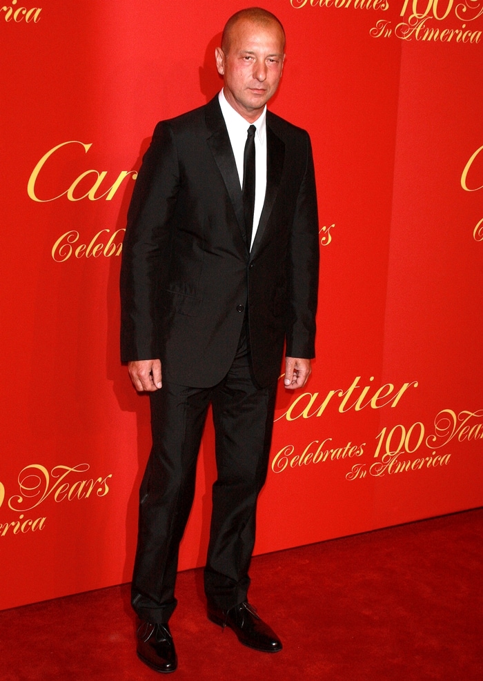 Helmut Lang at Cartier&rsquo;s 100th Anniversary in America celebration at the Cartier Fifth Avenue Mansion in New York City on April 30, 2009, showcasing his signature minimalist tailoring in a sleek black suit