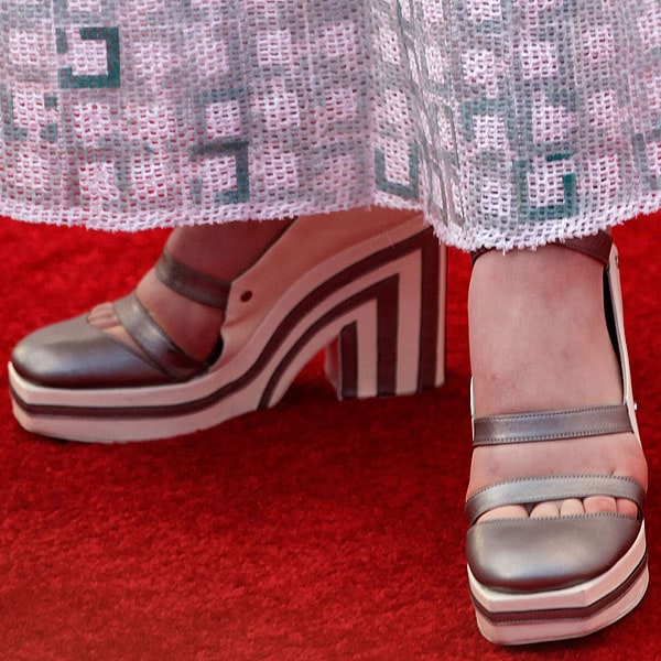 A closer look at Elle Fanning&rsquo;s bold choice of footwear: Chanel&rsquo;s Spring 2013 striped platform heels, featuring a striking closed-toe design and geometric pattern