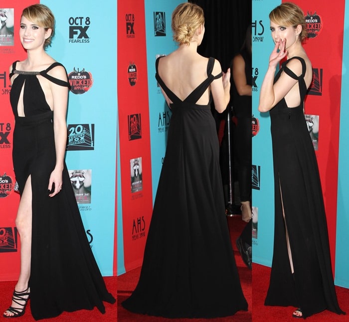 Emma Roberts flaunts her legs in a&nbsp;black gown featuring cutout details, a thigh-high slit, and an embellished neckline