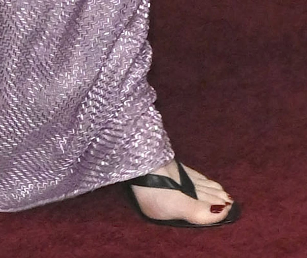 Emma Stone keeps her footwear simple with The Row&rsquo;s &ldquo;Sacha&rdquo; thong sandals