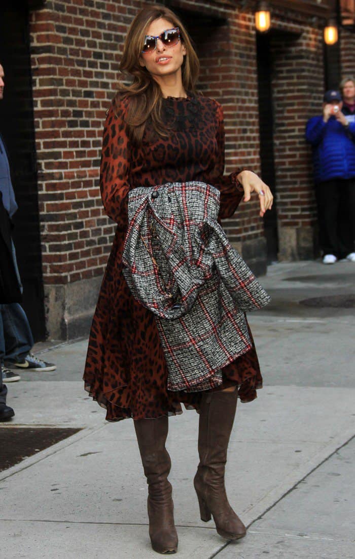 Eva Mendes turned heads by pairing brown suede boots with a striking leopard-print Dolce & Gabbana maxi dress during her appearance on the Late Show with David Letterman