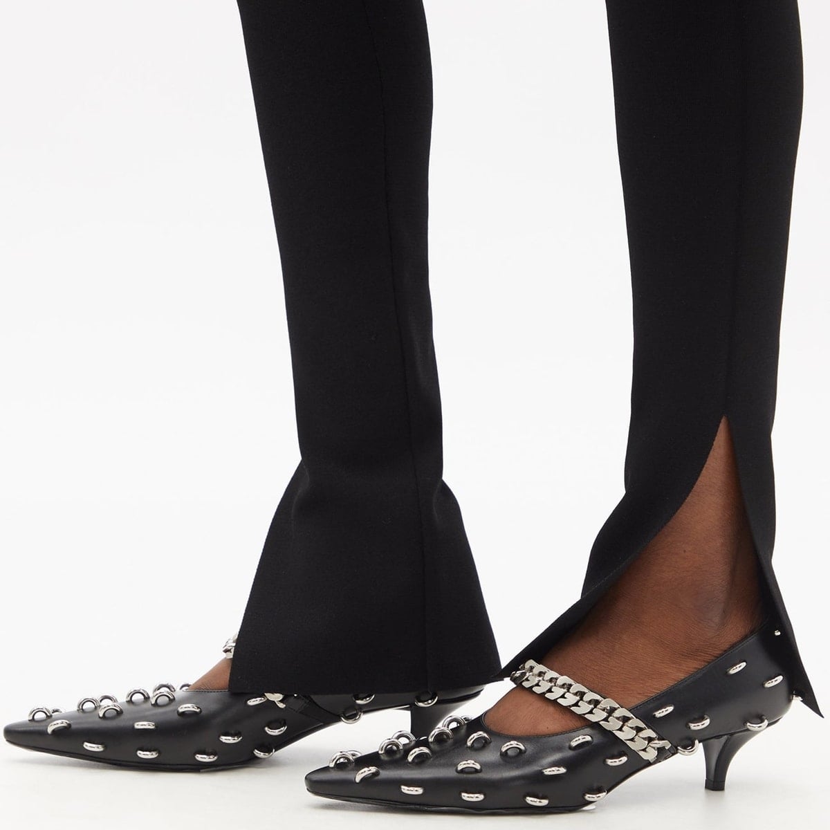 Black kitten heel pumps from Givenchy&rsquo;s Matthew M. Williams embellished with studded rings across the upper