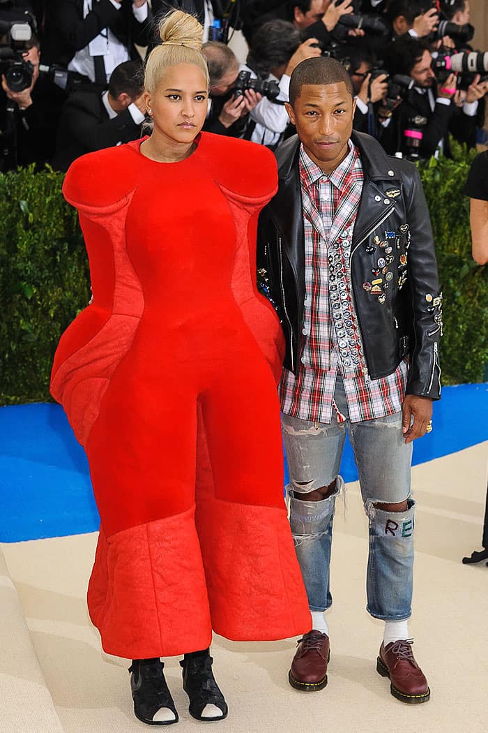 Helen Lasichanh and Pharrell Williams arriving at the 2017 Metropolitan Costume Institute Benefit Gala held at the Metropolitan Museum of Art in New York City on May 1, 2017.