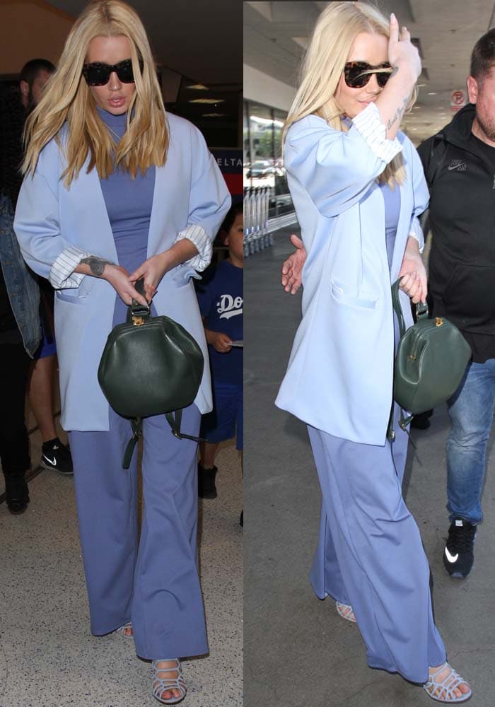 Iggy Azalea in&nbsp;a jumpsuit with a high neck and wide leg pants