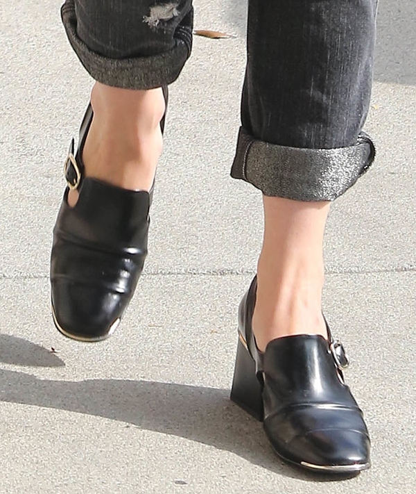 January Jones wearing&nbsp;black leather Balenciaga Cube loafers