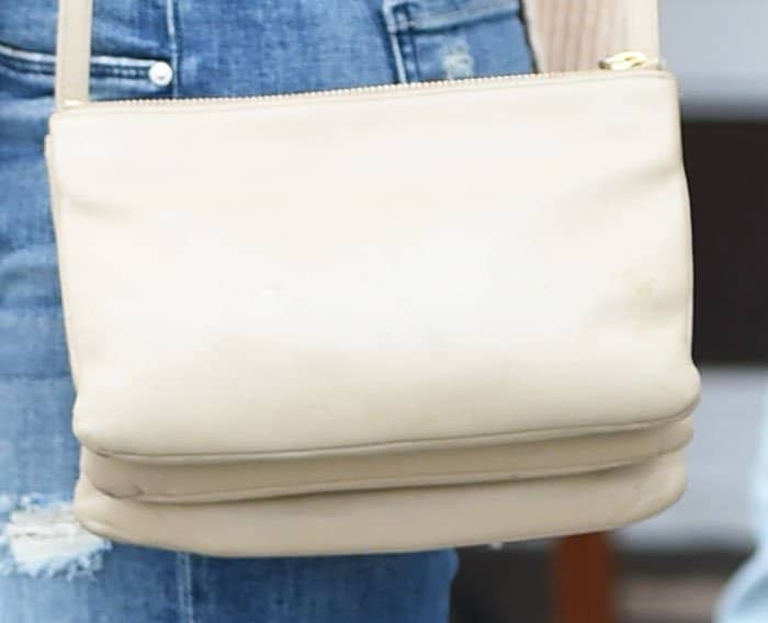Jenna matches her shoes and top with a similarly colored C&eacute;line "Trio" bag