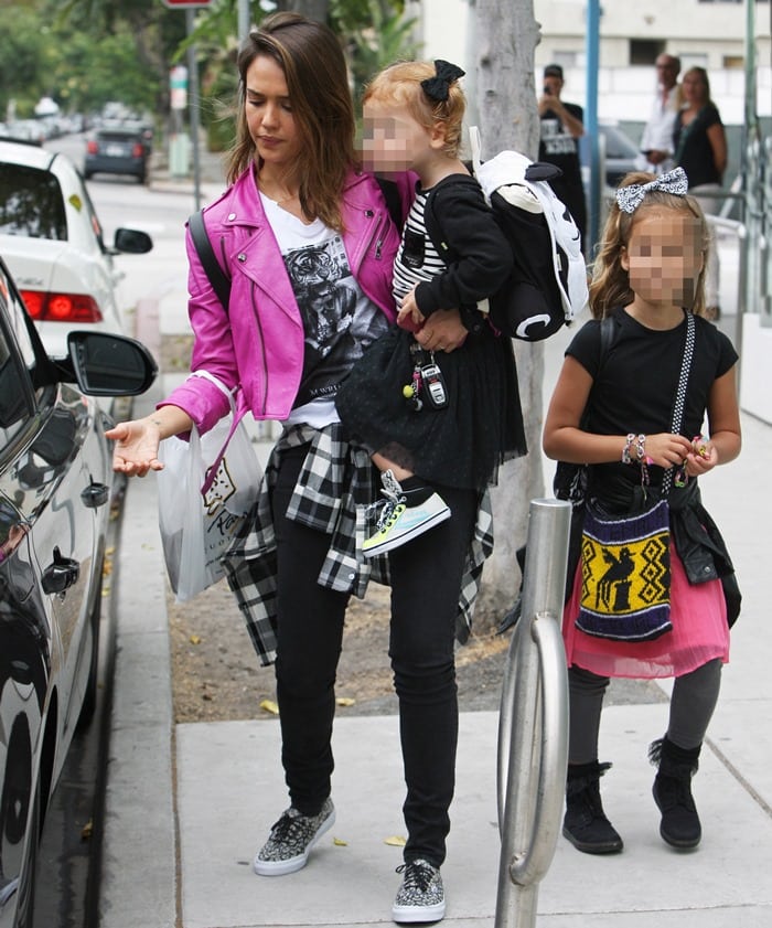 Jessica Alba wearing&nbsp;a pink Hyacinth lambskin jacket from the Ralph Lauren Collection