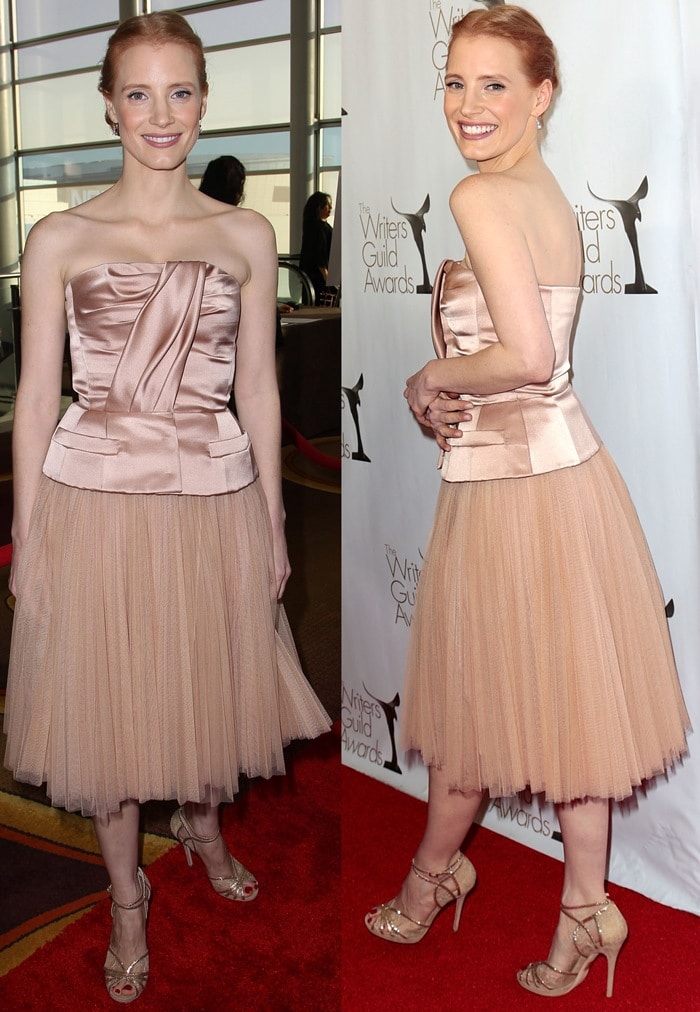 The actress poses on the red carpet, revealing the architectural corset-style bodice and airy tulle skirt that define the look&rsquo;s refined, ballet-inspired silhouette