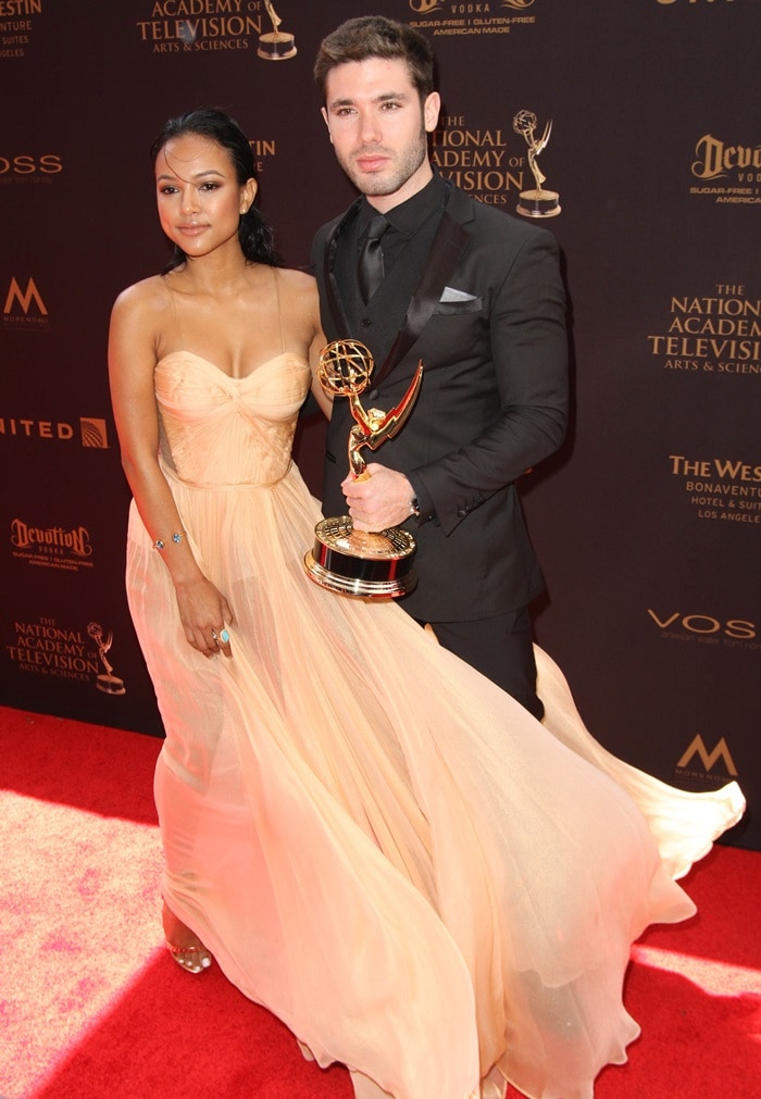 Karrueche Tran&nbsp;poses with Kristos Andrews and the Emmy they received for "The Bay"