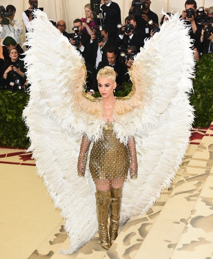Katy Perry wearing a&nbsp;gold&nbsp;sequin-embellished chainmail-inspired mini dress