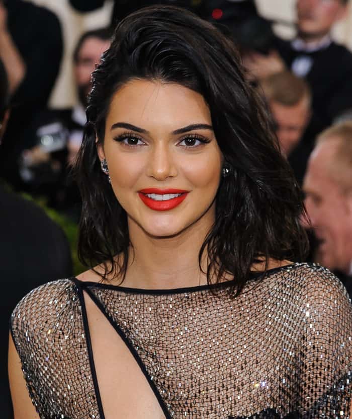 Kendall Jenner&nbsp;styled the barely-there dress with a painted macram&eacute; bodysuit