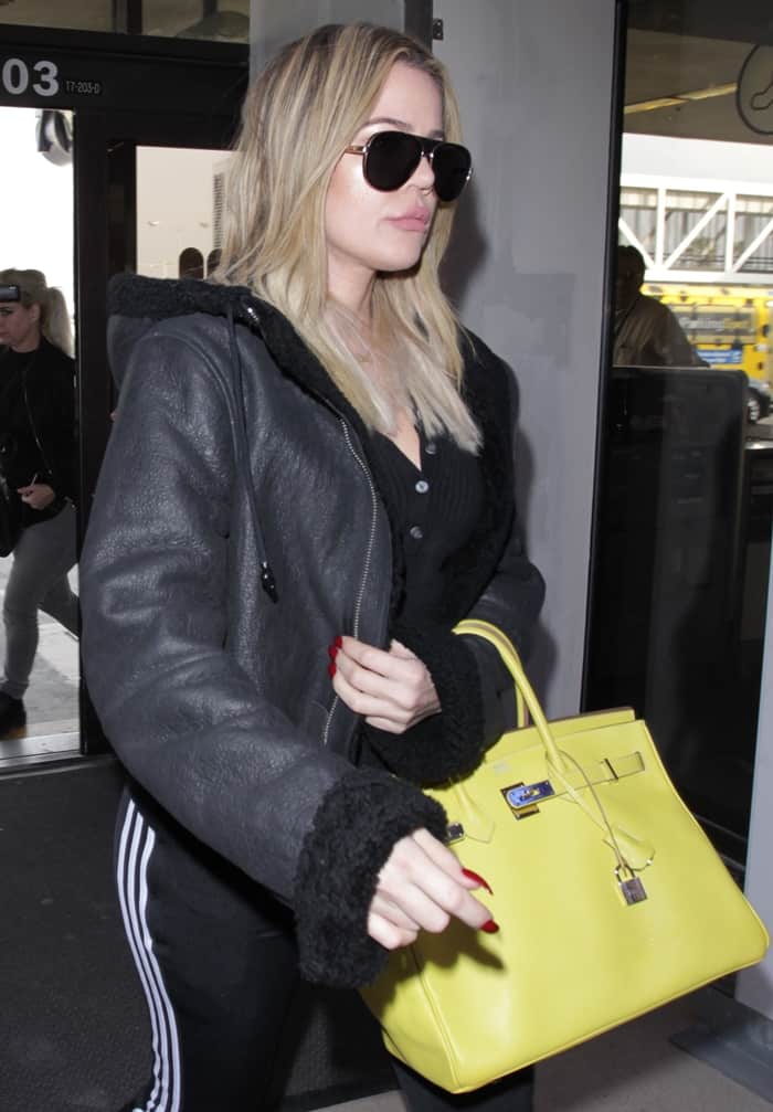 Khlo&eacute; Kardashian's lime colored Herm&egrave;s handbag