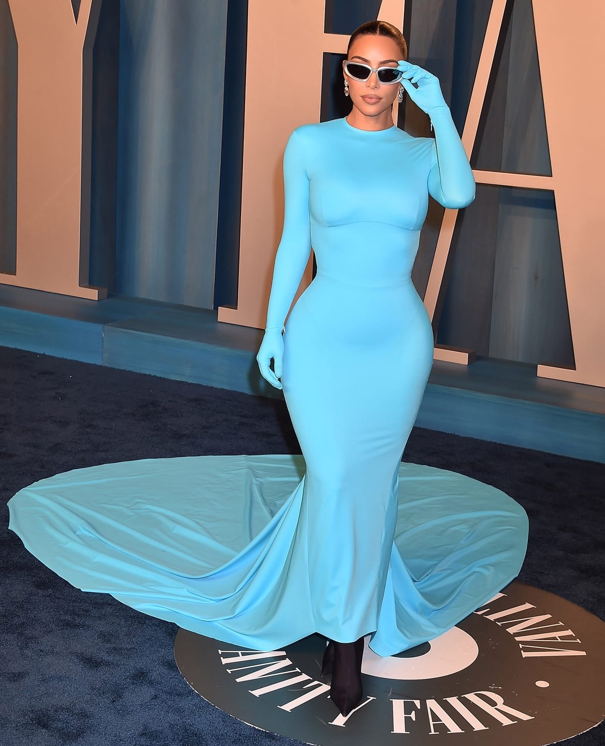 Kim Kardashian stuns in a blue Balenciaga Fall 2022 dress at the Vanity Fair After-Oscars Party on March 27, 2022