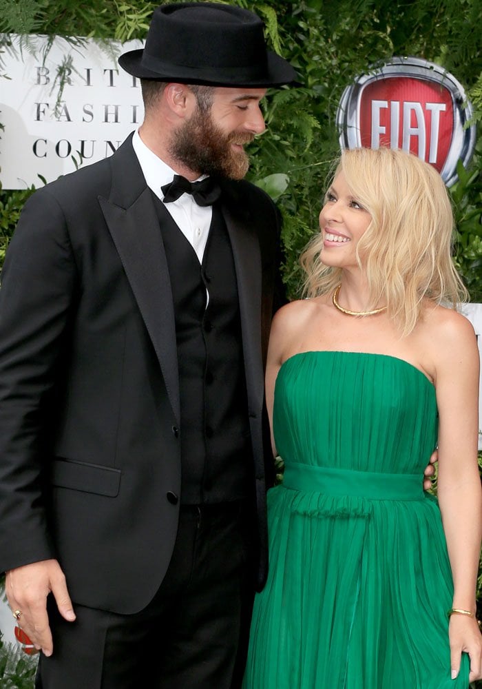 The look of love: Kylie poses with her fianc&eacute; on the red carpet