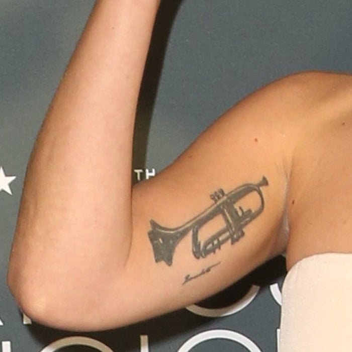 Lady Gaga's trumpet arm tattoo in honor of&nbsp;jazz musician Tony Bennett