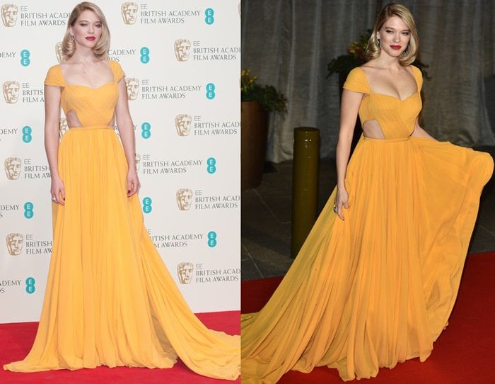 L&eacute;a Seydoux's yellow Prada dress with cap sleeves and cut-outs at the waist