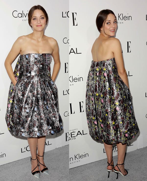 Marion Cotillard exudes playful elegance in a structured metallic strapless Dior dress with a voluminous silhouette and pointed ankle-strap heels at ELLE&rsquo;s 20th Annual Women in Hollywood Celebration on October 22, 2013