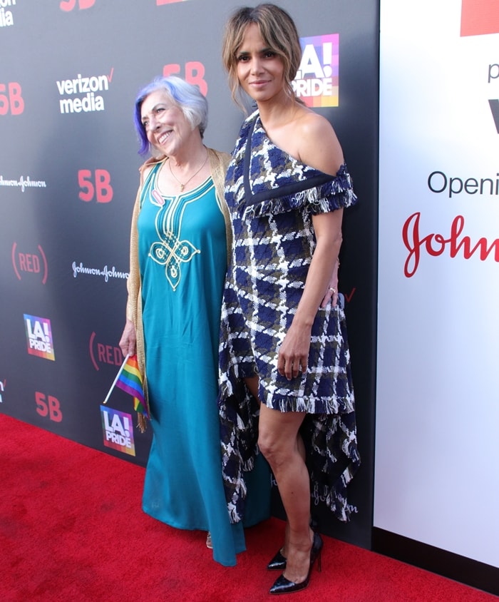 Nurse Alison Moed, who worked at the world&rsquo;s first AIDS ward, joins Halle Berry at the U.S. premiere of 5B during LA Pride, where Berry grounded her asymmetrical dress with sleek black pointed-toe pumps