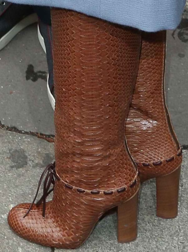 Showcasing the luxurious texture, these are Olivia Palermo's Chlo&eacute; python knee boots, complete with a practical back zip