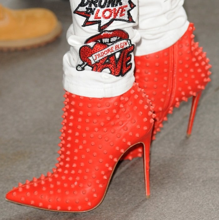 Rita Ora in&nbsp;red studded Christian Louboutin Snakilta booties