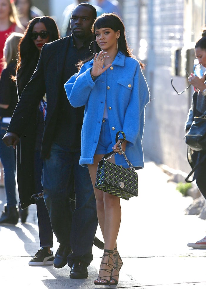 Recreate Rihanna&rsquo;s effortlessly bold look with an oversized blue coat, strappy lace-up heels, and a statement quilted handbag for a chic and daring vibe