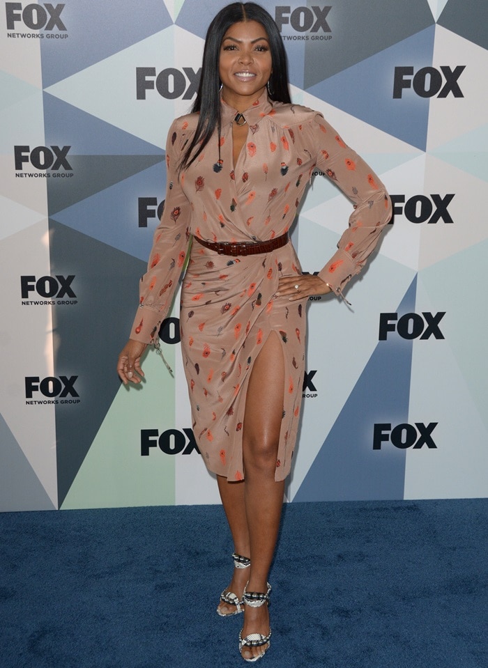 Taraji P. Henson&nbsp;in a feather-printed&nbsp;Altuzarra Fall 2018 dress featuring a collared neckline and wrap front bodice