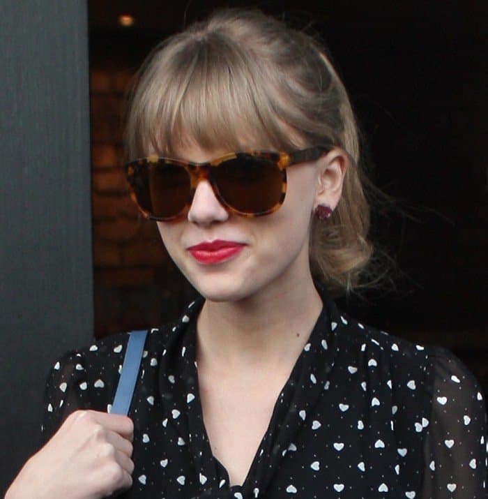 Taylor Swift wearing Ralph Lauren Collection &ldquo;Ricky&rdquo; sunglasses