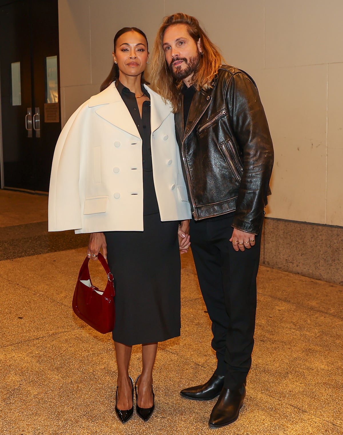 Zoe Salda&ntilde;a with Marco Perego at The View studios to discuss The Absence of Eden dressed in a black Gucci shirt dress with a white Gucci jacket