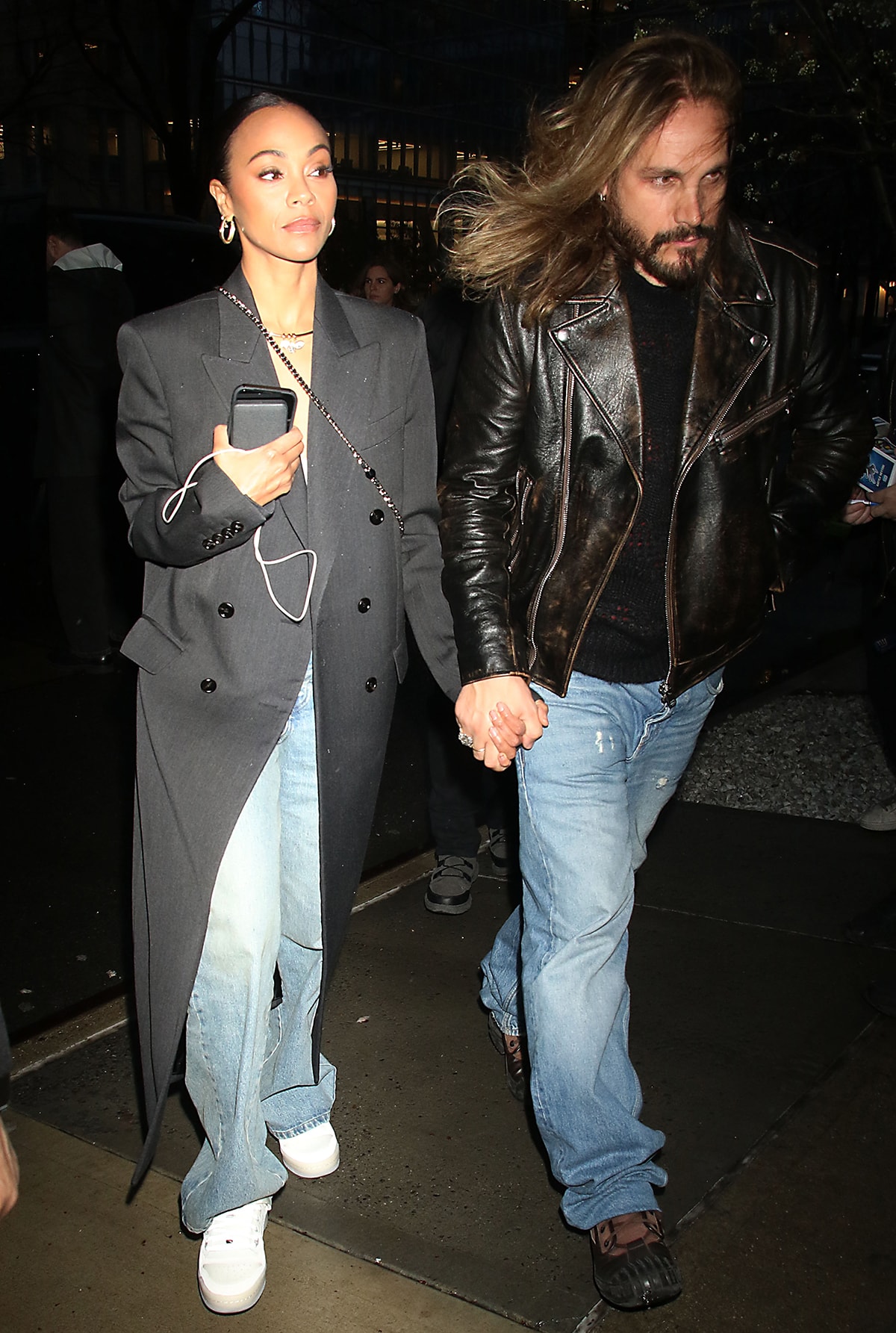 Zoe Salda&ntilde;a and Marco Perego head to The View in cool, casual outfits to discuss The Absence of Eden on March 28, 2024