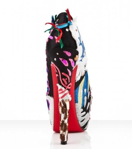 These pumps feature a patchwork of multicolor sequins, rhinestones, embroidery, appliqu&eacute;, ribbons, writing, metal beading, and chains