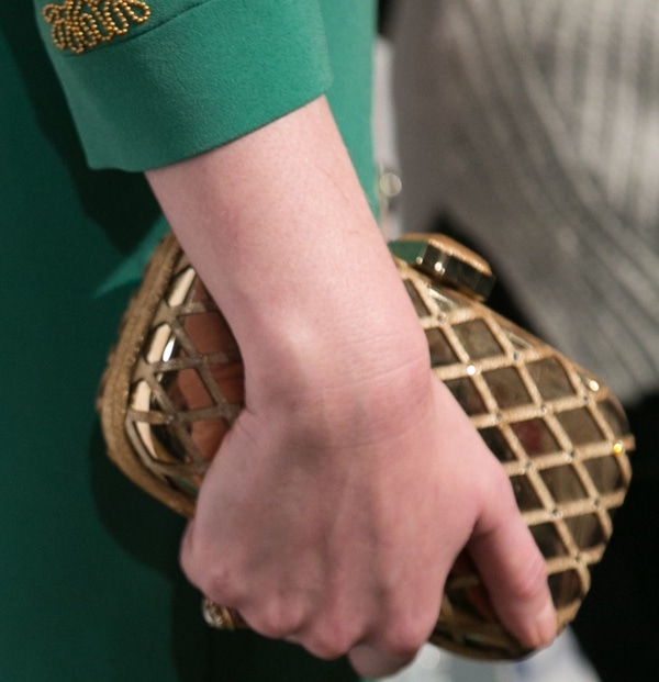 Christina Hendricks toted a gold clutch at the &lsquo;Mad Men&rsquo; presentation
