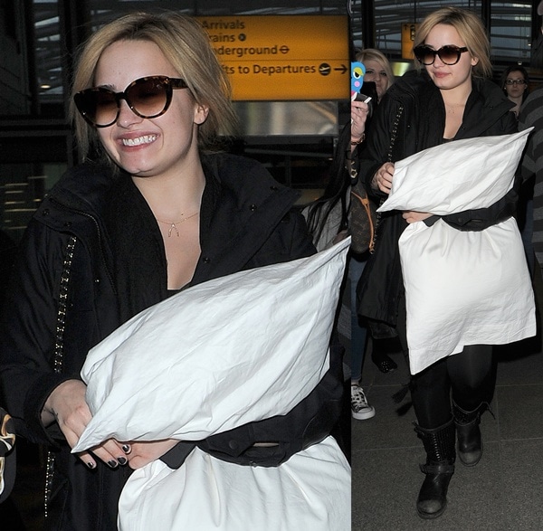 Demi Lovato&nbsp;clutching a large pillow