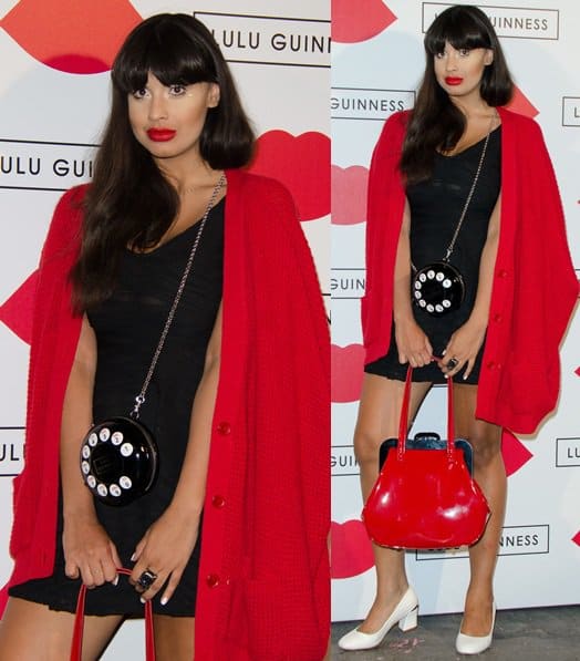 Jameela Jamil pairs a little black dress and white block heels with Lulu Guinness&rsquo;s bold accessories &mdash; the red patent 'Mid Pollyanna' handbag and playful 'Dial M for Murder Fiona' rotary phone clutch &mdash; making a head-turning statement at the 2013 Paint Project party