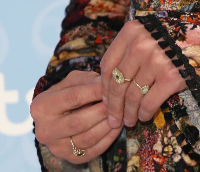 Jenna Coleman accessorized the red carpet look with a curated mix of delicate gold rings that complemented the dress&rsquo;s ornate embroidered detailing