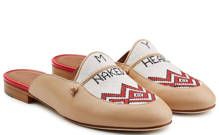Crafted with ivory leather and featuring an embroidered linen front, these Malone Souliers x Natalia Vodianova &ldquo;Neva&rdquo; slippers beautifully reference the Naked Heart Foundation, blending luxury with philanthropy