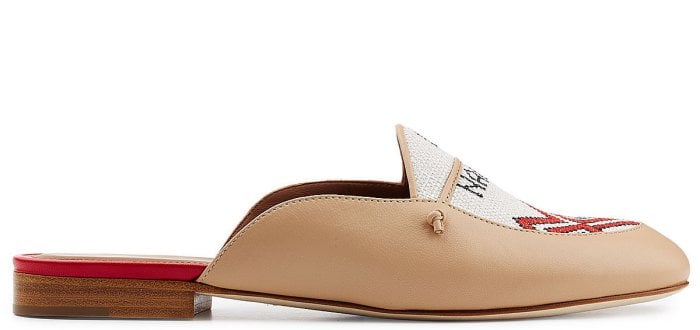 The side view of the &ldquo;Neva&rdquo; leather slippers by Malone Souliers x Natalia Vodianova showcases the delicate linen stitching, embodying a tribute to craftsmanship and Natalia's commitment to her foundation