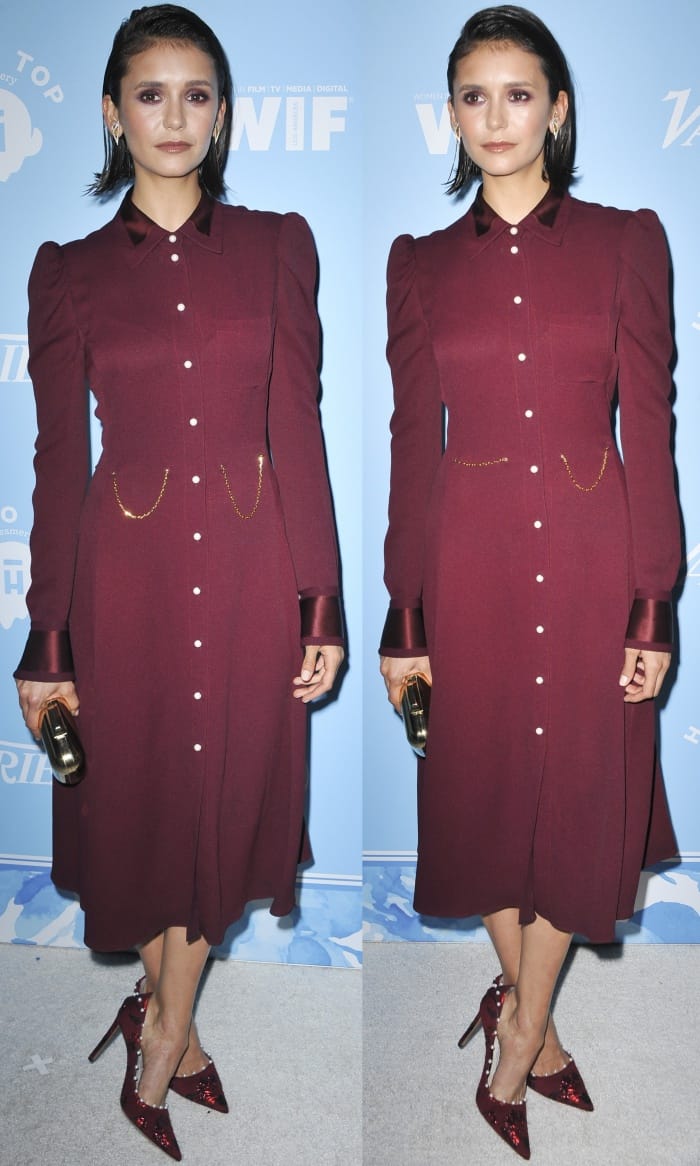 Nina Dobrev in a burgundy button front dress at Variety and Women in Film&rsquo;s 69th Pre-Emmy Awards party