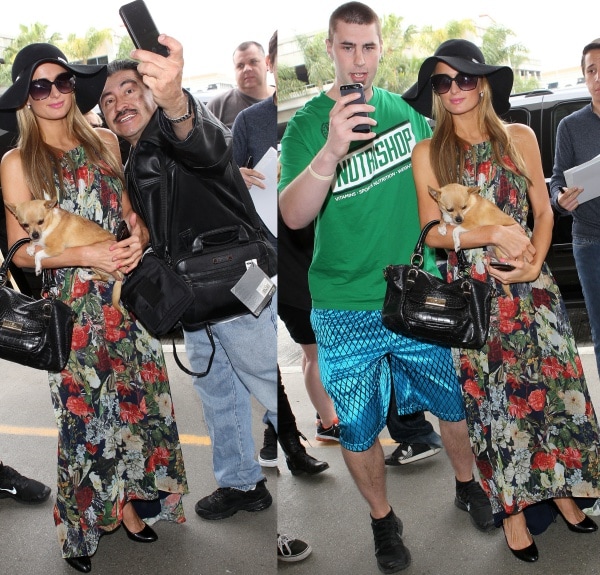 Paris Hilton wore a sleeveless Alice + Olivia &ldquo;Wheaton&rdquo; maxi dress featuring a romantic floral print, crinkle-pleated skirt, and high-low hemline&mdash;perfectly paired with black Prada pumps crafted in glossy patent leather with sleek silver stiletto heels